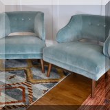 F07. Pair of modern occasional chairs with blue velvet upholstery. 29”h x 30”w x 29”d 